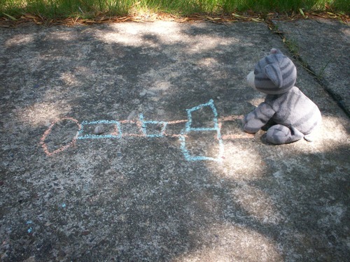 Kitty plays hopscotch